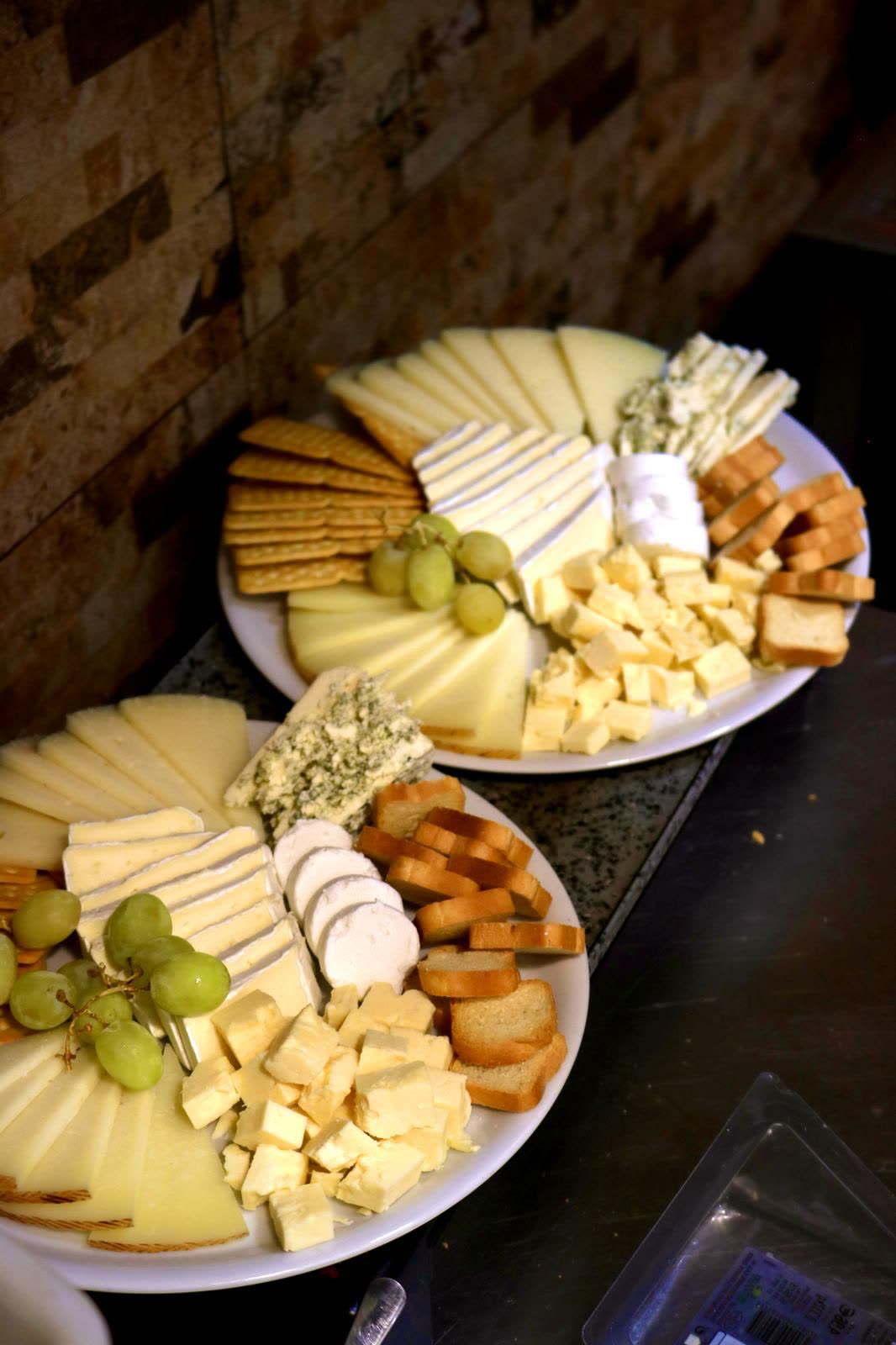 Cheese platters with grapes, crackers and bread at Dream Park
