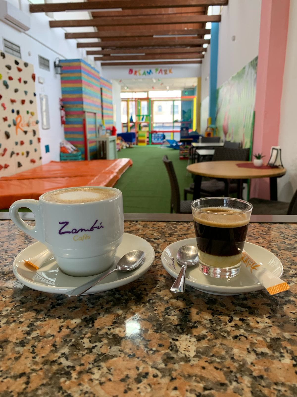 Coffee and espresso served at the Dream Park café with the play area behind