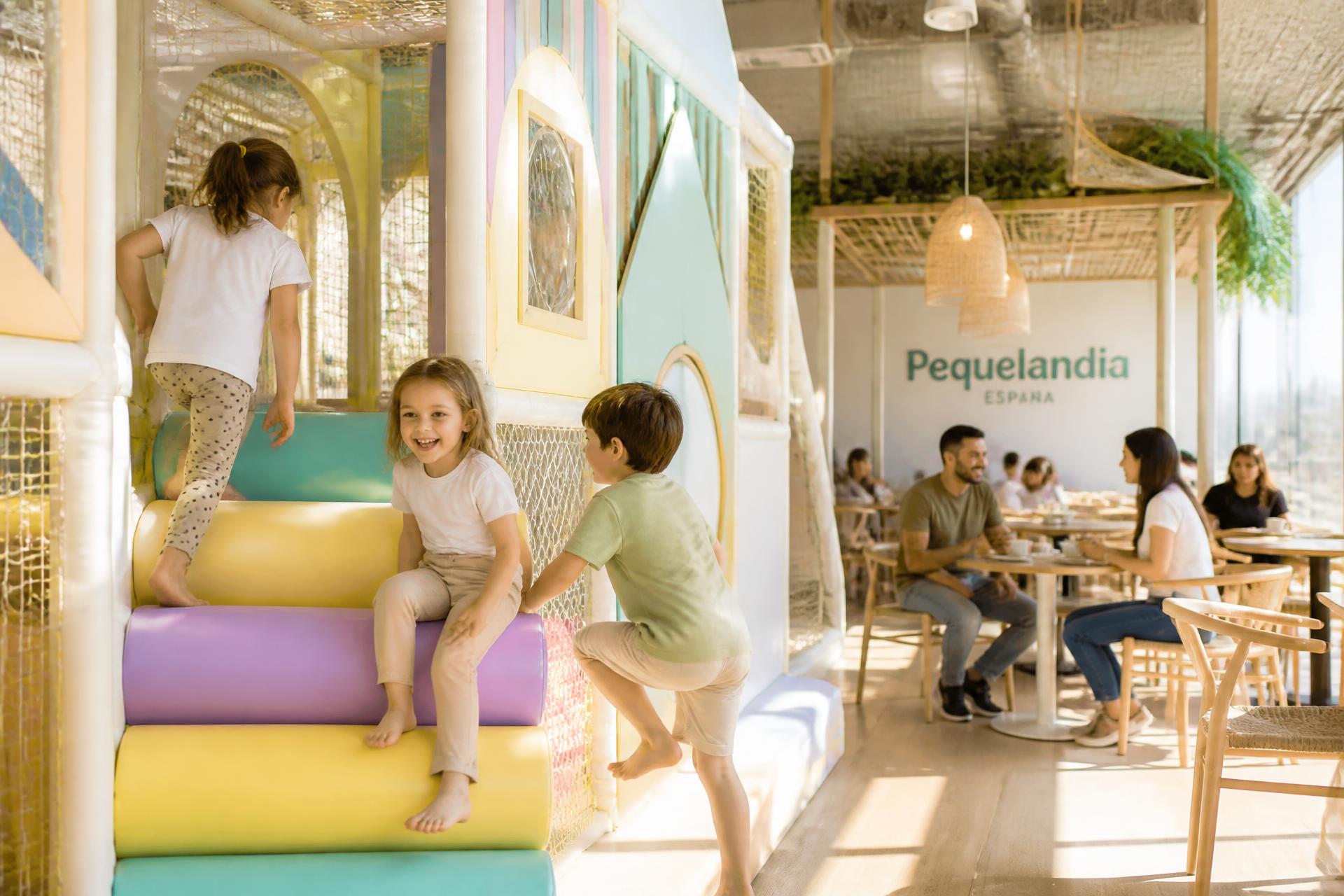 Children climbing the soft play structure